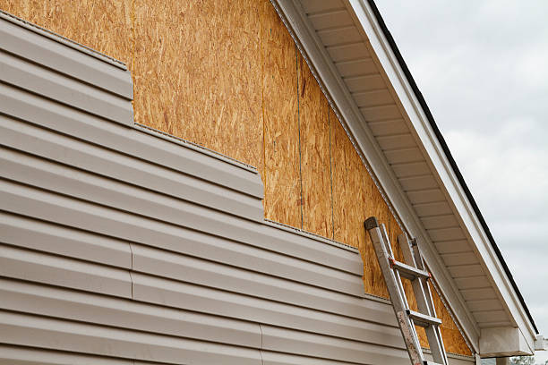 Professional Siding technician working in Greens Fork, IN